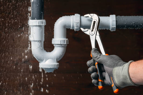 Professional Emergency Plumber technician working in Martensdale, IA